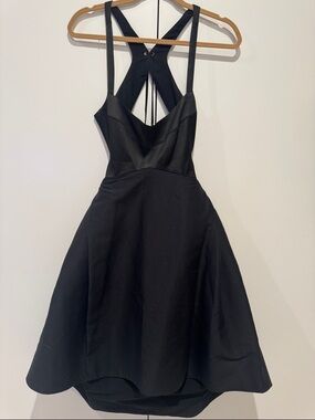 HALSTON Elegant Black A-Line Dress with Strappy Back
